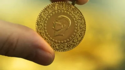 Küresel piyasalarda belirsizlik devam ederken ons altın sabah saatlerinde 4.211