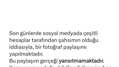 Söz konusu fotoğrafta, kadın bir polisin başörtülü bir öğrenciye müdahale