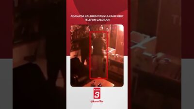 Adana’da kaldırım taşıyla bir iş yerinin camını kıran şahıslar, tablet