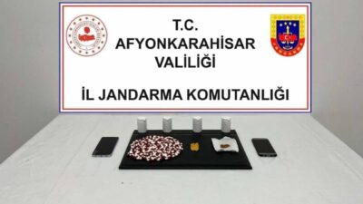 Afyonkarahisar’da jandarma tarafından bir adrese yapılan baskında uyuşturucu haplar ile