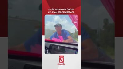 Adana’da trafik ışıklarında gelin arabasından para alamayınca kaputuna atlayan ve