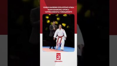 Yenilen rakibinin üzüldüğünü gören down sendromlu sporcu yaptığı hareketle yürekleri