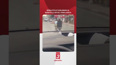 Bisikletle giderken elle sinyal vererek şerit değiştiren amca, sosyal medyada
