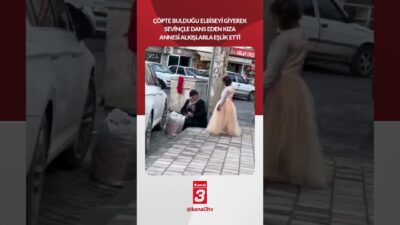 Çöpte bulduğu elbiseyi giyerek sevinçle dans eden kıza, annesi alkışlarla