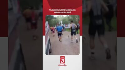 İzmir’de düzenlenen triatlon yarışına kaçak olarak giren bir kuzu, sporcularla