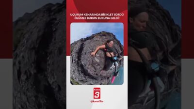 Uçurumun kenarında bisiklet süren bir kadın, başına gelen korkunç olayı