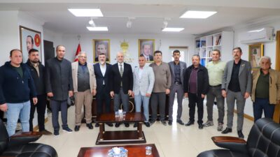 Afyonkarahisar Muhtarlar Derneği Başkanı Suat Uygur ve beraberindeki 11 mahalle