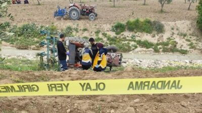 Kilis'in Beşenli köyünde tarlada çalışma yaparken devrilen traktörün altında kalan