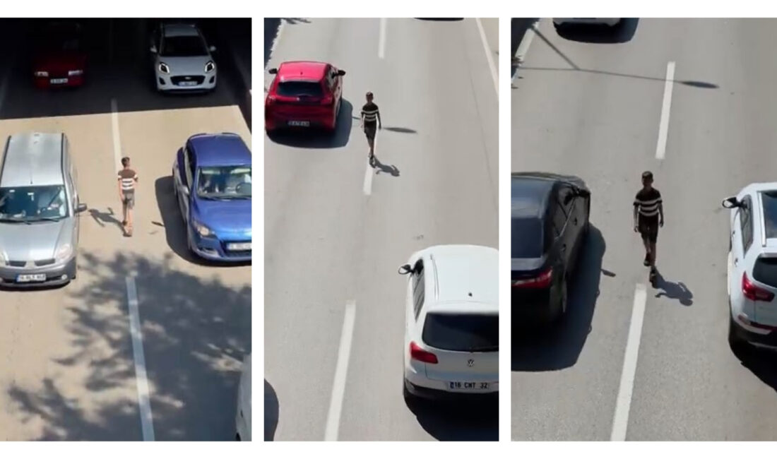 Bursa'da bir çocuk, akan trafikte canını hiçe sayarak yürüdü. Tehlikeli