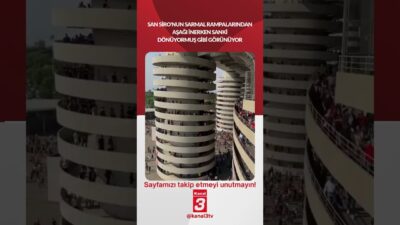 San Siro’nun sarmal rampalarından aşağı inerken sanki dönüyormuş gibi görünüyor…