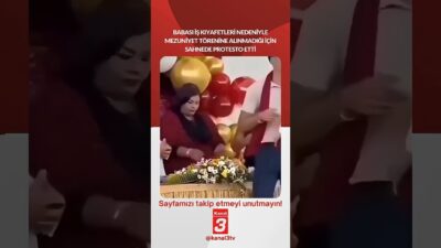 Babası iş kıyafetleri nedeniyle mezuniyet törenine alınmadığı için sahnede protesto