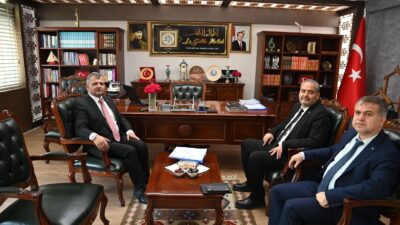 AFSÜ Rektörü Prof. Dr. Adem Aslan, beraberinde Genel Sekreter Murat